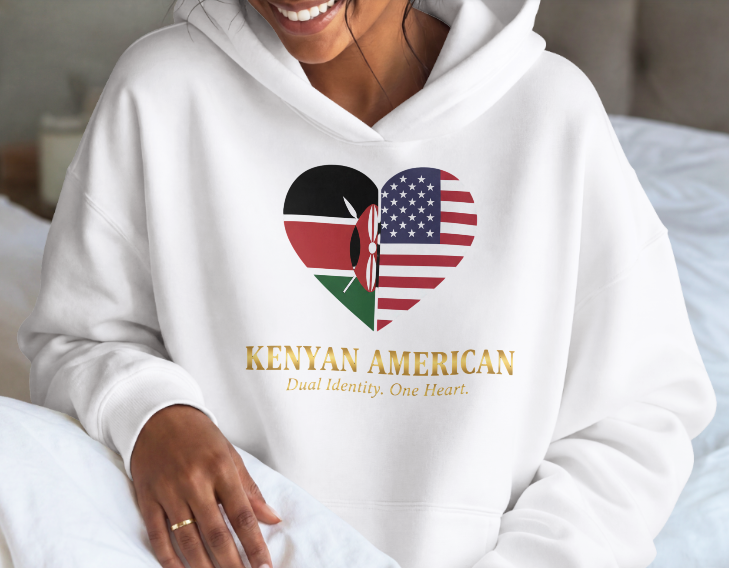 White Kenyan-American Dual Identity Hoodie close-up with gold Kenyan American lettering